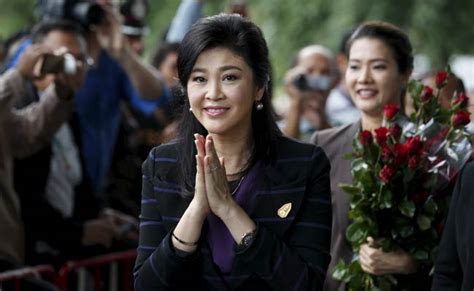 ousted thailand prime minister yingluck defends rice subsidy at