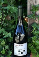 Image result for Saxon Brown Syrah Flora Ranch. Size: 128 x 185. Source: winespies.com