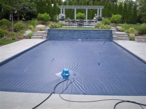 pool cover pump  essential item  winterizing  protecting  pool cover diycontrols blog