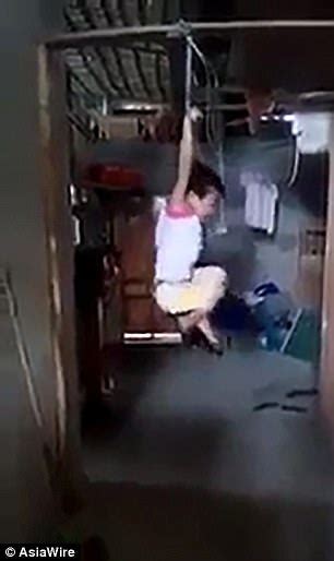 girl is strung up by wrists by cruel vietnamese foster mum daily mail