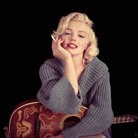 Marilyn Monroe Smoking With Guitar