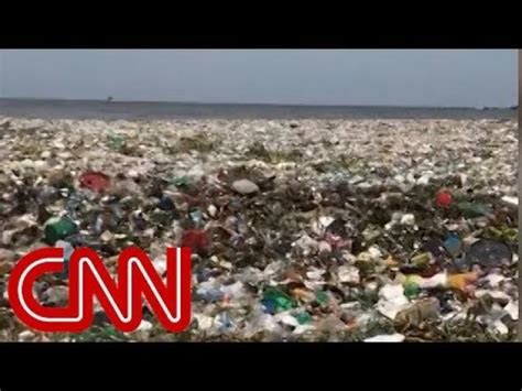 see wave of garbage crash off the dominican republic eww video
