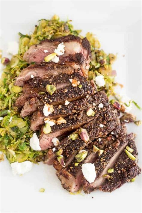 strip steak over shaved brussels sprouts by sonia the