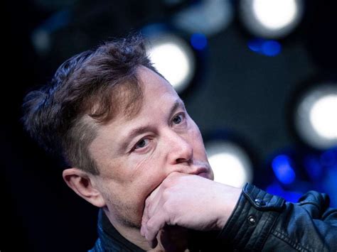 elon musk threatens  anonymous worlds biggest hack group