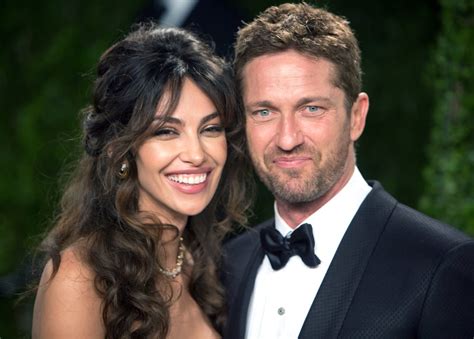 gerard butler and madalina ghenea celebrity couples at the oscars