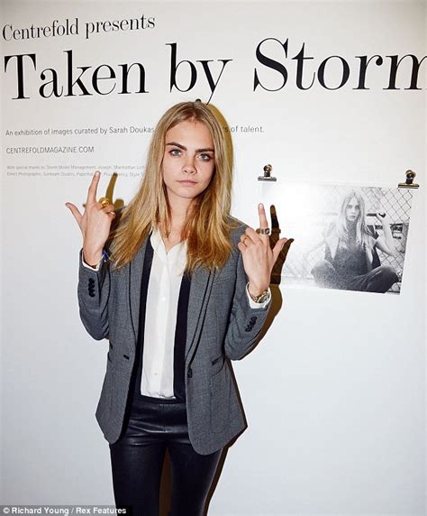 cara delevingne shows off some quirky dance moves as she attends fashion photography exhibition