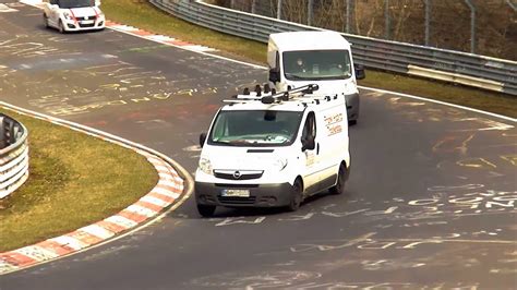 video bmw  barely avoids  falling motorcyclist   nuerburgring ruetir