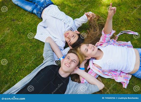 smiling kids  fun  lying        sky children playing outdoors