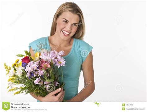 happy woman holding flowers stock image image of person midlife 10547147