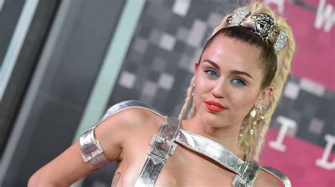 miley cyrus s 8 craziest looks of the year we ve come to expect just