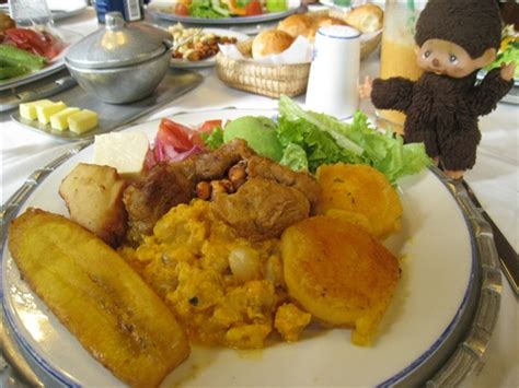 lunch of several common ecuadorian food platanos llapingachos and