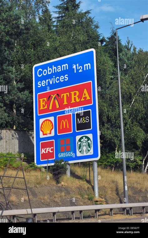 british road sign indicating  motorway services