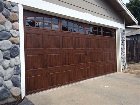 walnut garage doors wooden garage doors doors