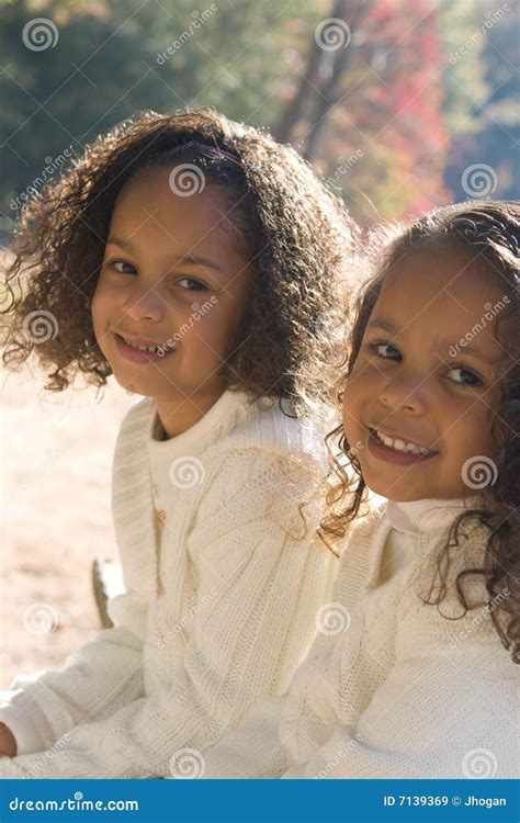 sisters stock image image  outdoors biracial multiethnic