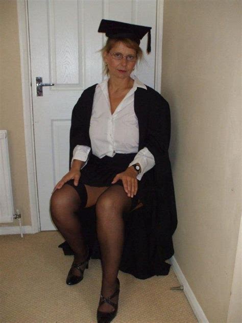 british busty milf sally dressed as a school mistress