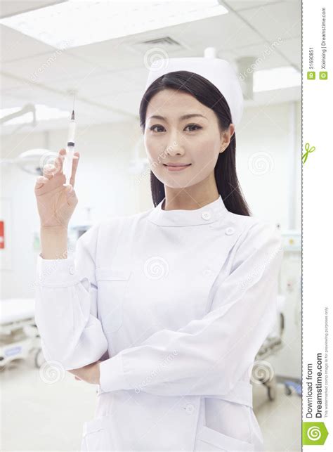 Portrait Of Nurse Holding A Syringe Stock Image Image Of