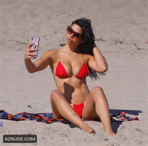 Suelyn Medeiros Shows Off Her Curves In A Bright Red