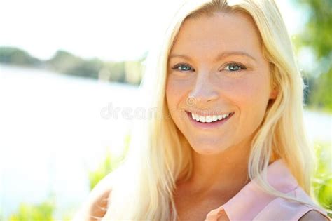 Natural Beauty Portrait Of A Beautiful Blonde Outside With Copyspace
