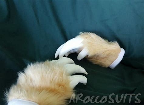 fursuit hands tan white