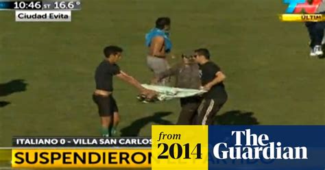 hooligans invade pitch to strip player during game in argentina