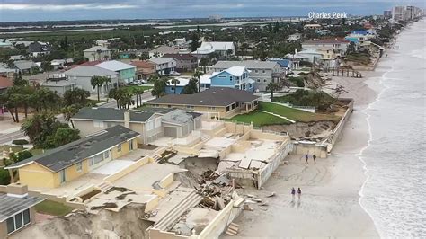 charles peek drone footage shows  collapsed home   shore