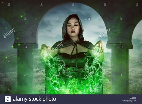 Asian Witch Woman Casting Spell With Concentration The