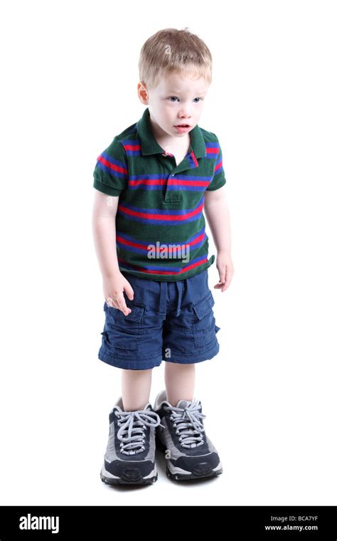 child wearing big shoes  res stock photography  images alamy