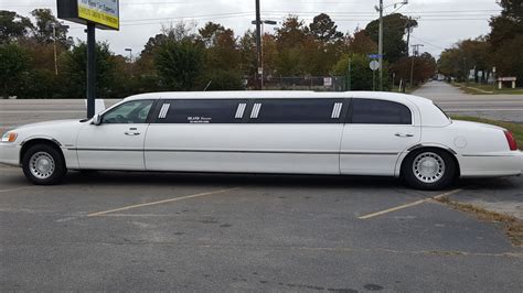 white lincoln limousine town car super stretch limousine goldstarr limousine service