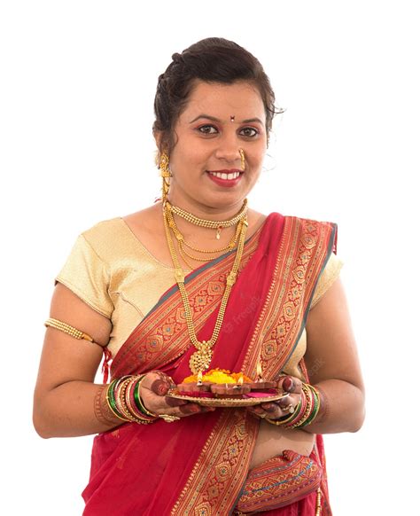 Premium Photo Portrait Of A Indian Traditional Girl Holding Pooja