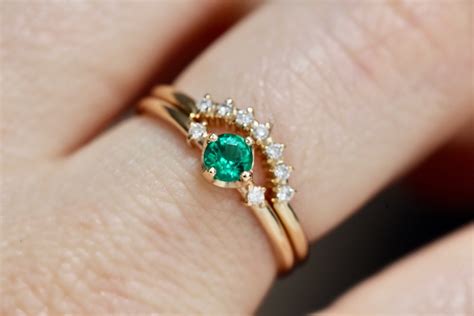 gold emerald diamond ring