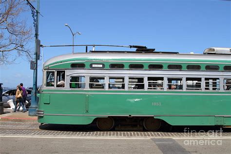 riding  green trolley train  san francisco  photograph  wingsdomain art