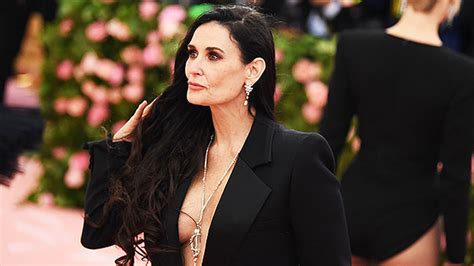 demi moore poses in bathtub with joan of arc overlooking