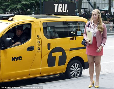 amy schumer shows off toned legs in pink mini skirt daily mail online