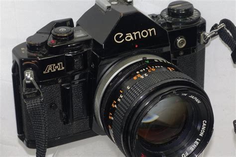 neat black canon  camera  canon fd   mm catawiki