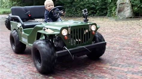 jeep  children  hero  year  boy drives gasoline powered