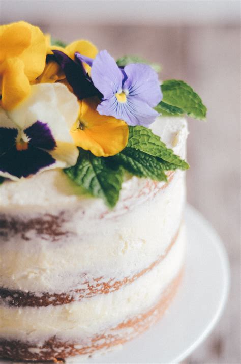 triple lemon naked layer cake with edible flowers buttered side up