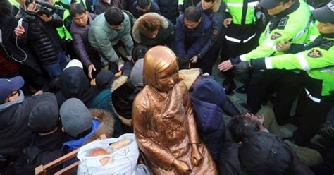 south korea buddhist monk sets himself afire to protest