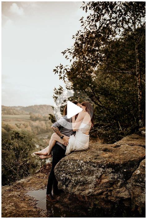 kissing on cliffs and waterfall frolics in this epic engagement shoot