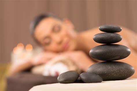 learn about the benefits of hot stone massage massagetique