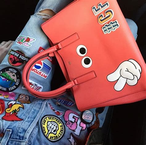 A Bag Or Phone Covered In Anya Hindmarch Stickers Fashion Week Street