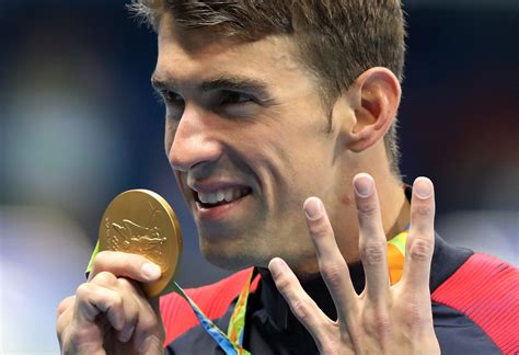 phelps gets 23rd gold as us men s women s 4x100 relay teams win