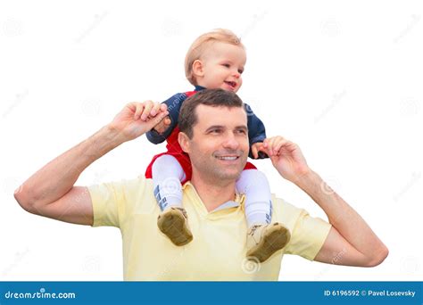 boy  sitting   shoulders  dad stock photo