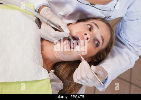 dentist   pull  terrified patients tooth stock photo alamy
