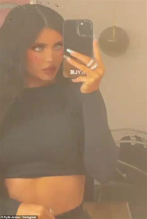 Kylie Jenner Flashes Her Taut Tummy In Black Crop Top And Matching