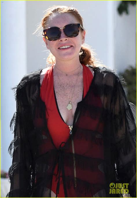 Lindsay Lohan Flaunts Her Figure In Red One Piece Swimsuit Photo