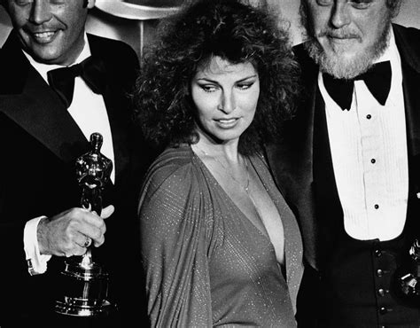 actress raquel welch poses for photographers backstage