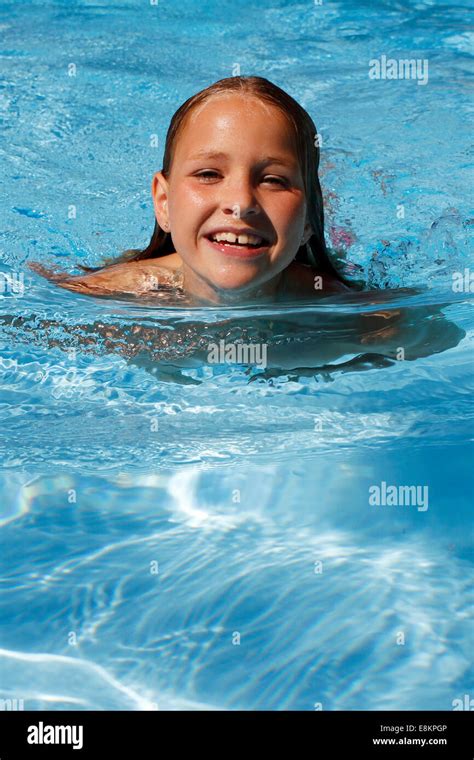 year  girl swimming   swimming pool stock photo alamy