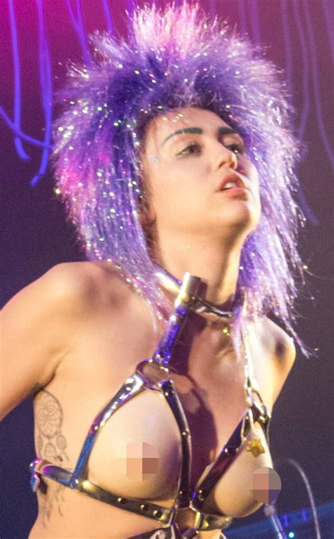 fake boobs from miley cyrus wildest concert pics e news