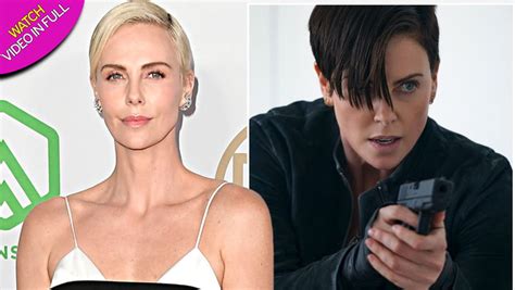 charlize theron celebrates as the old guard smashes