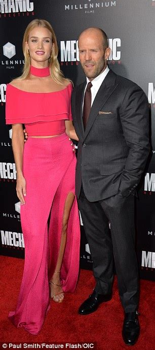 Rosie Huntington Whiteley In Hot Pink Two Piece With Jason Statham At
